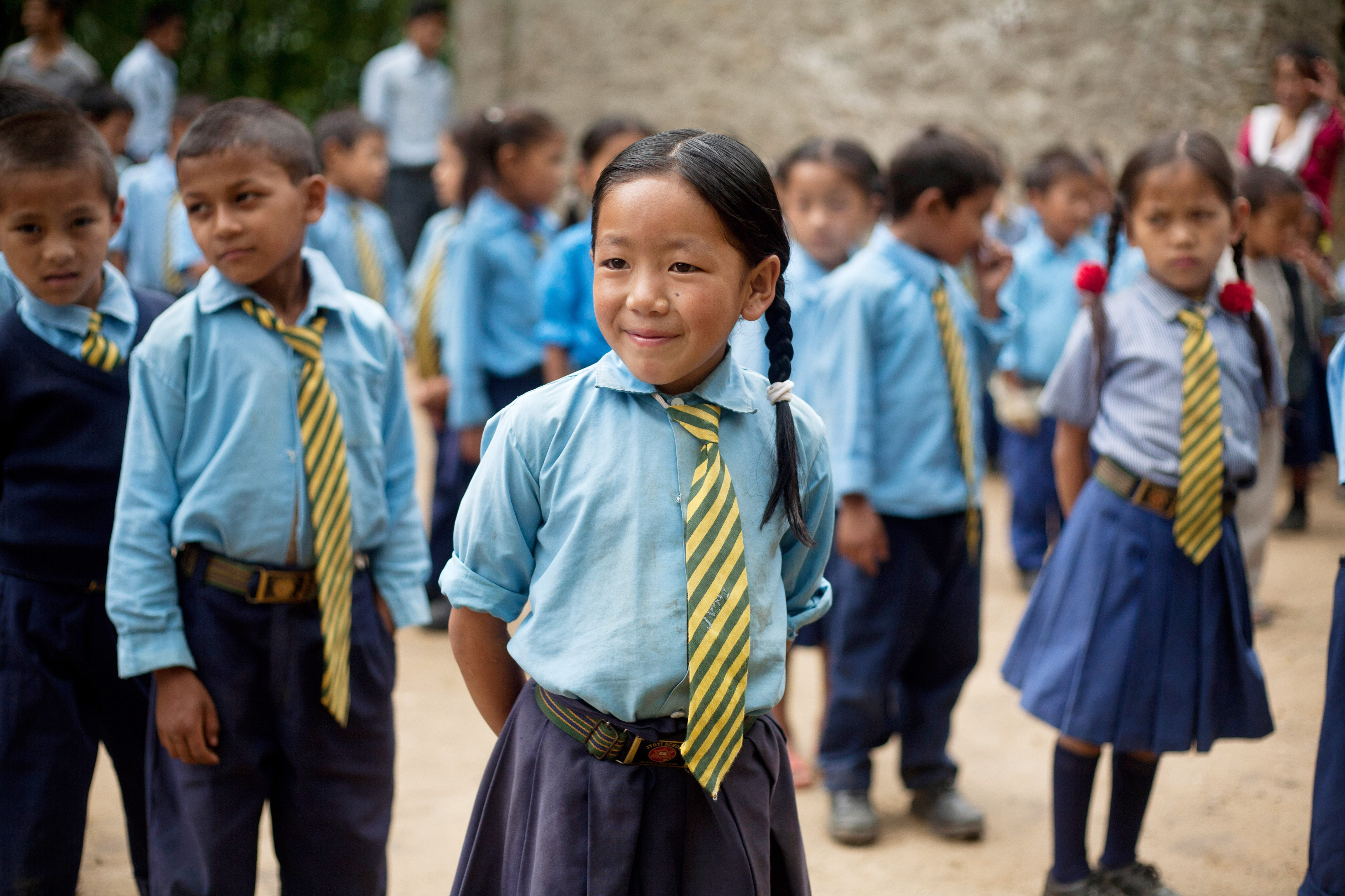 Sanju Rai, 9, during the morning assembly in the school in Nepal