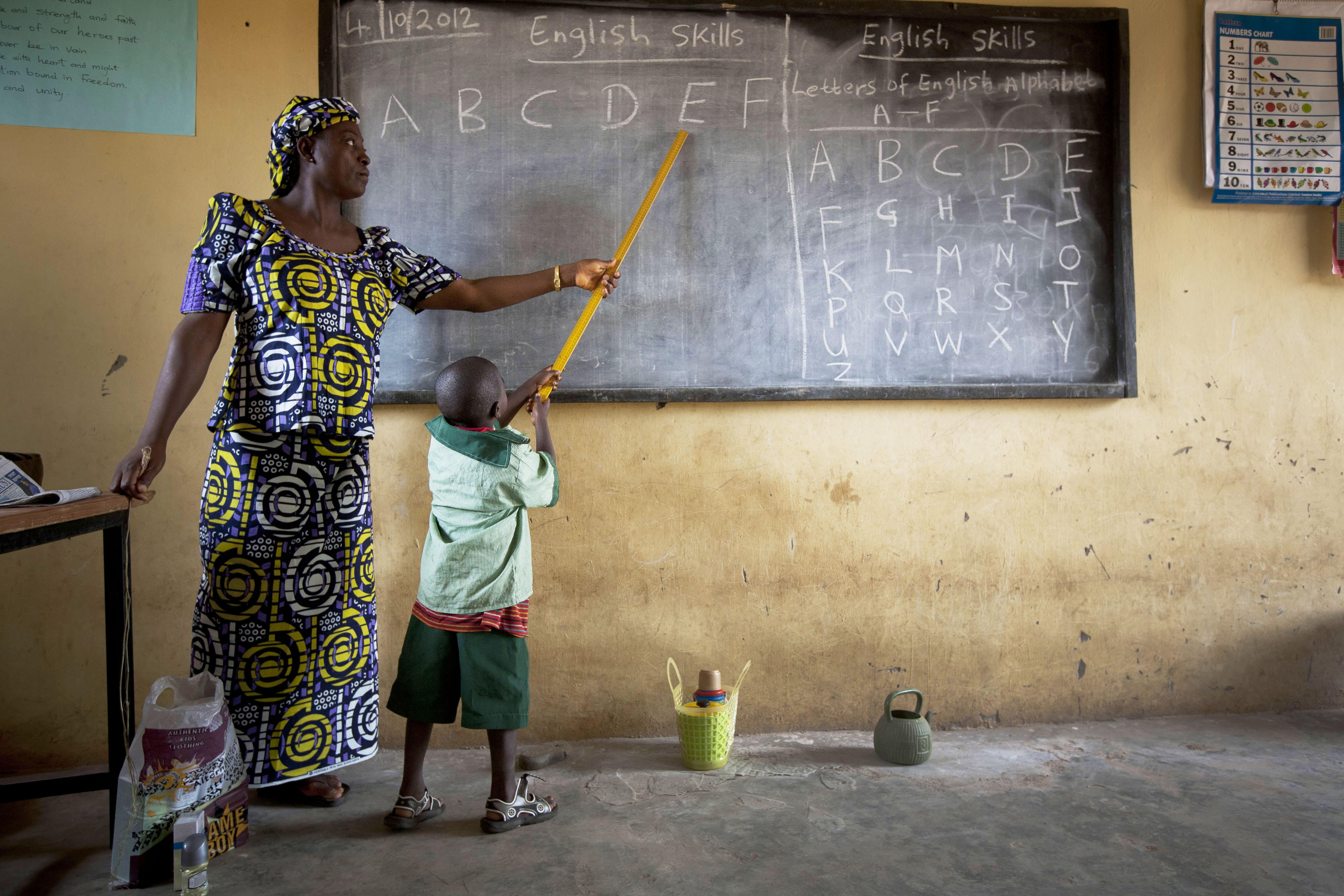 Ladi T. Danlami with schoolchildren in Yangoji Primary School where she teaches, Abuja State, Nigeri