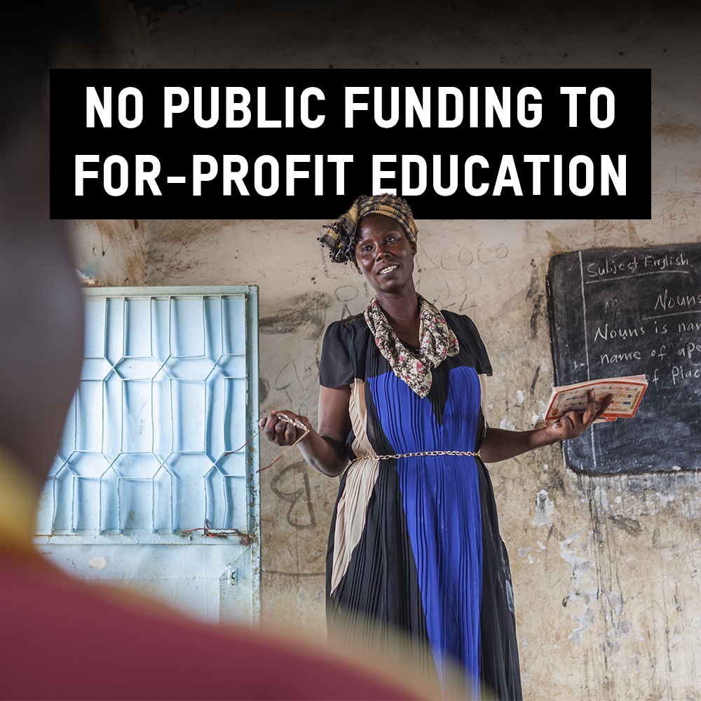 Woman standing in front of blackboard