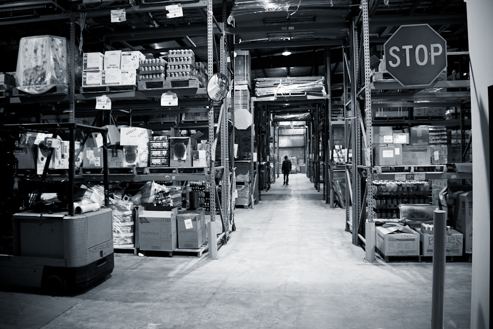 Black and white image of a food bank warehouse