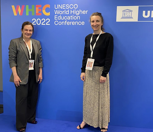Two women in front of WHEC2022